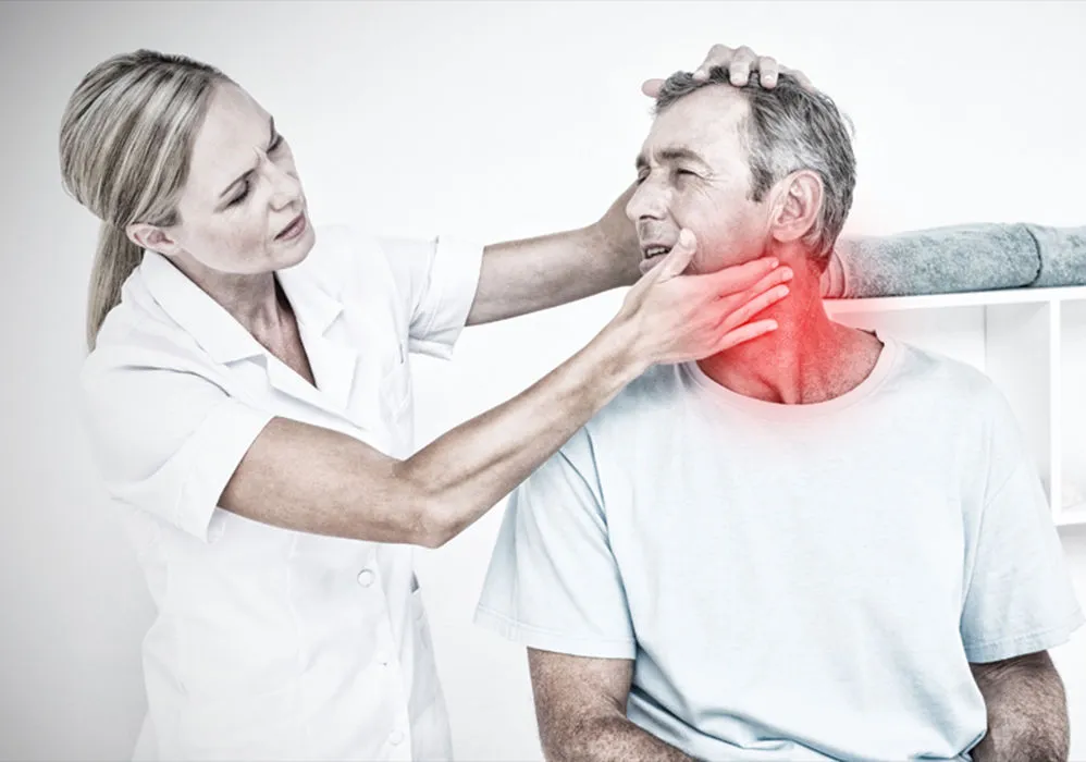 Doctor examining a patient's neck.